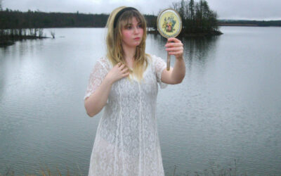 Sabrina Trueheart steps through the neon mirror on “Alice in Videoland”